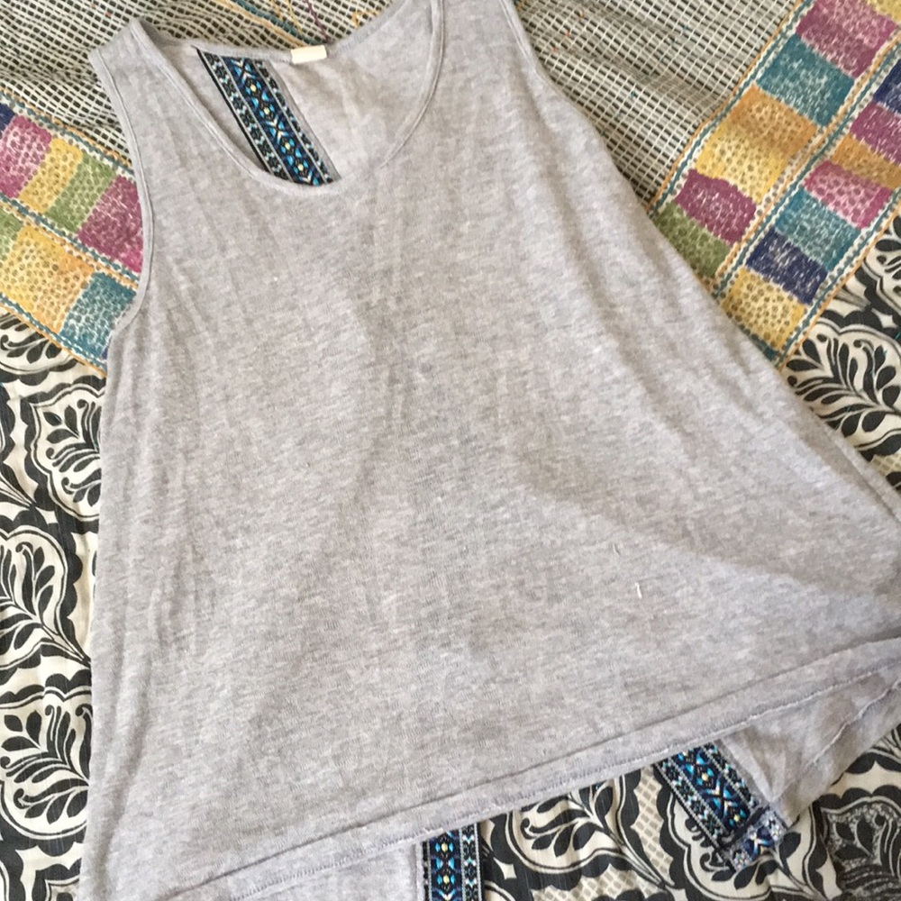 Tank with open back